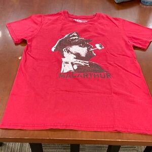 Woman’s T-shirt ( used and in good condition)